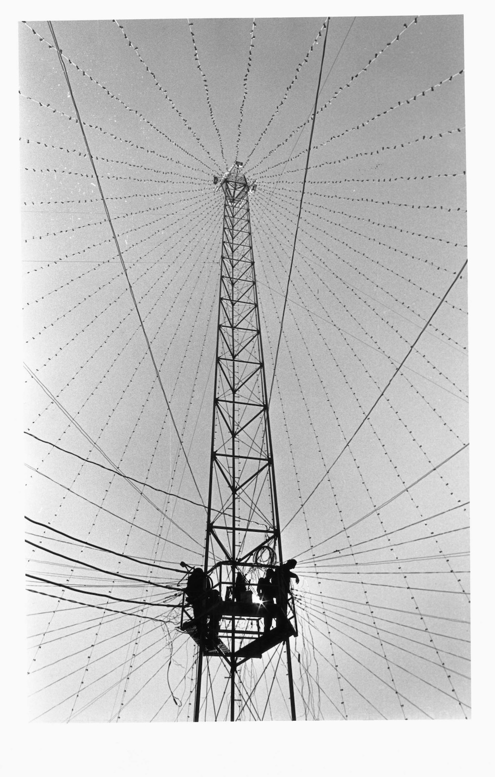 Historical image of moon tower holiday lights